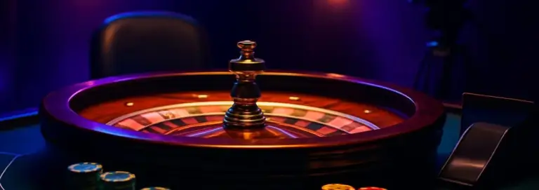 Live table banner with a roulette wheel, chips and studio lights